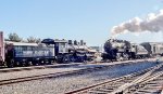 BLW 26 at the head of the Santa train passes Rahway Valley steam locomotive 15 in the Steamtown yard.